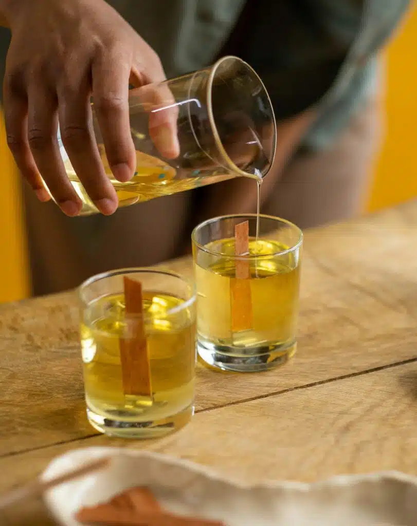 pouring wax into jar